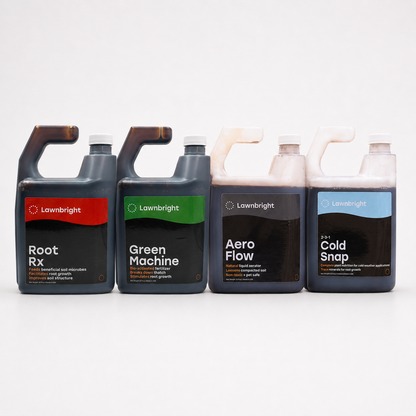 Four Lawnbright liquid plant care bottles arranged in a row on a light gray background: Root Rx, Green Machine, Aero Flow, and Cold Snap.