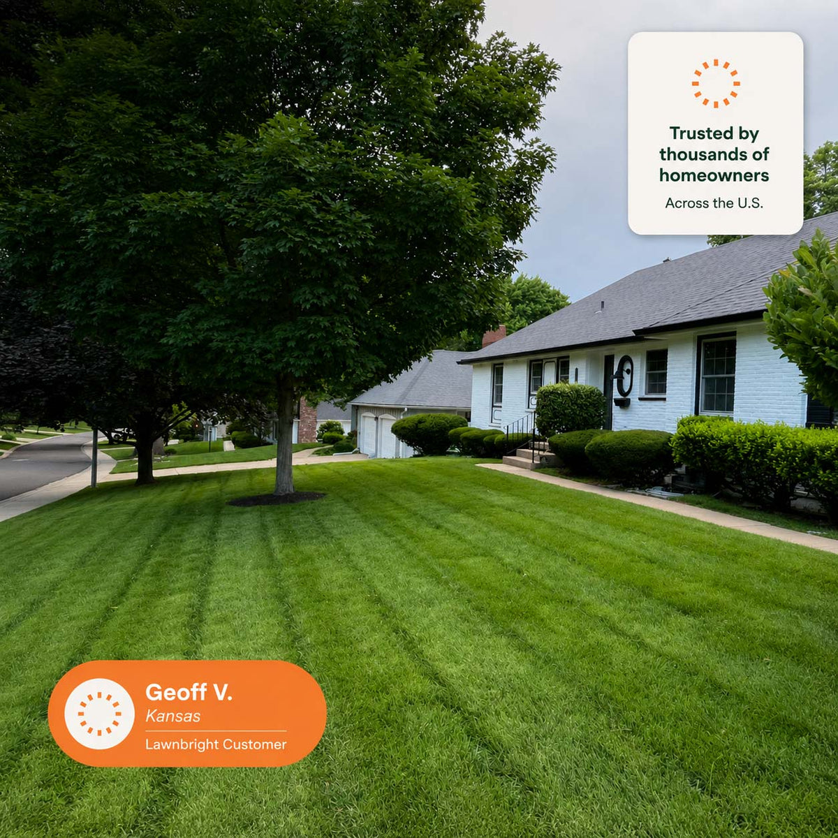 A well-maintained green front lawn with a suburban house, trees, and a sidewalk in the background. An orange badge at the bottom left reads 'Geoff V.