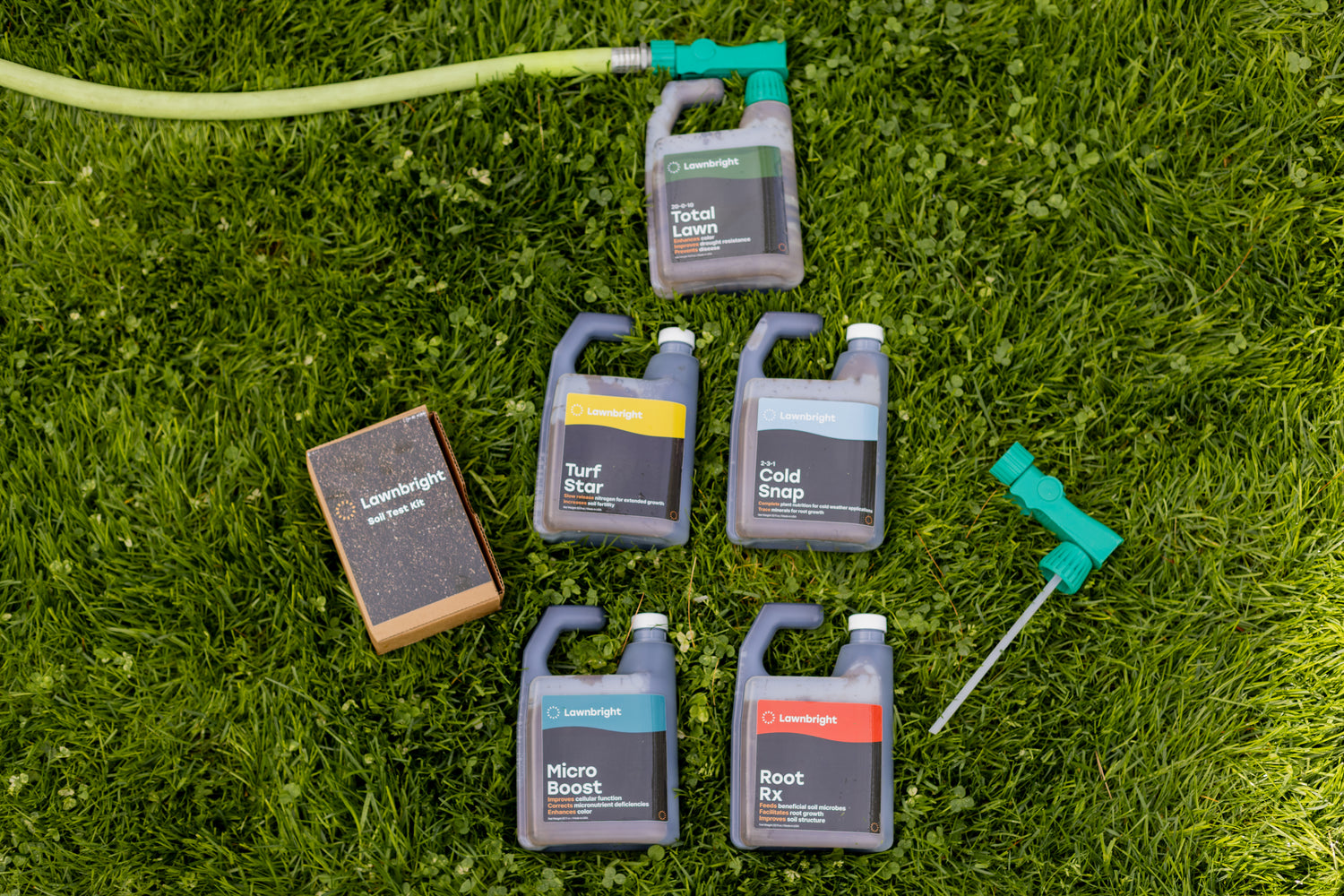 Collection of lawn care products on grass